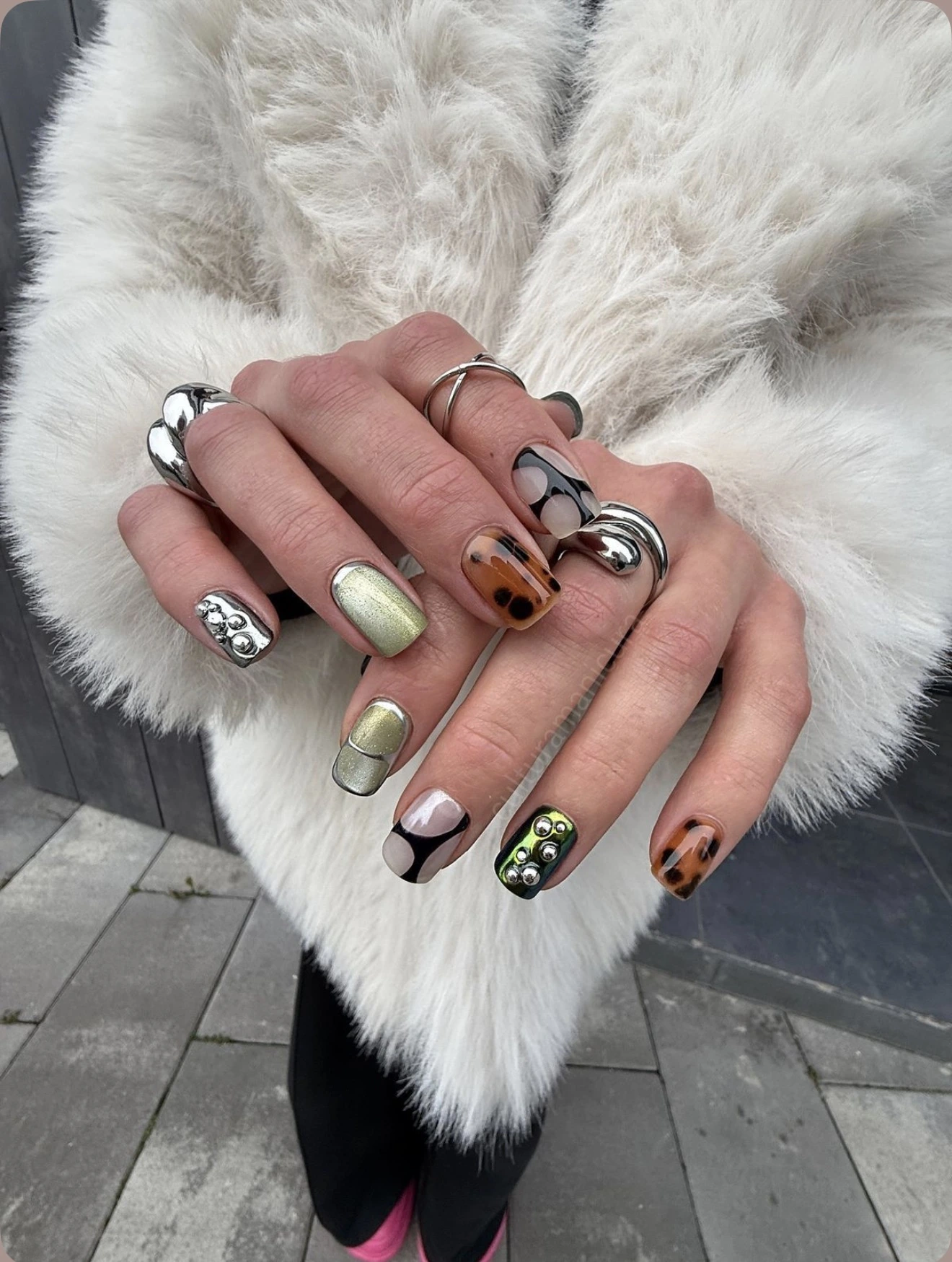 Chrome, tortoiseshell and stud mixed nail art