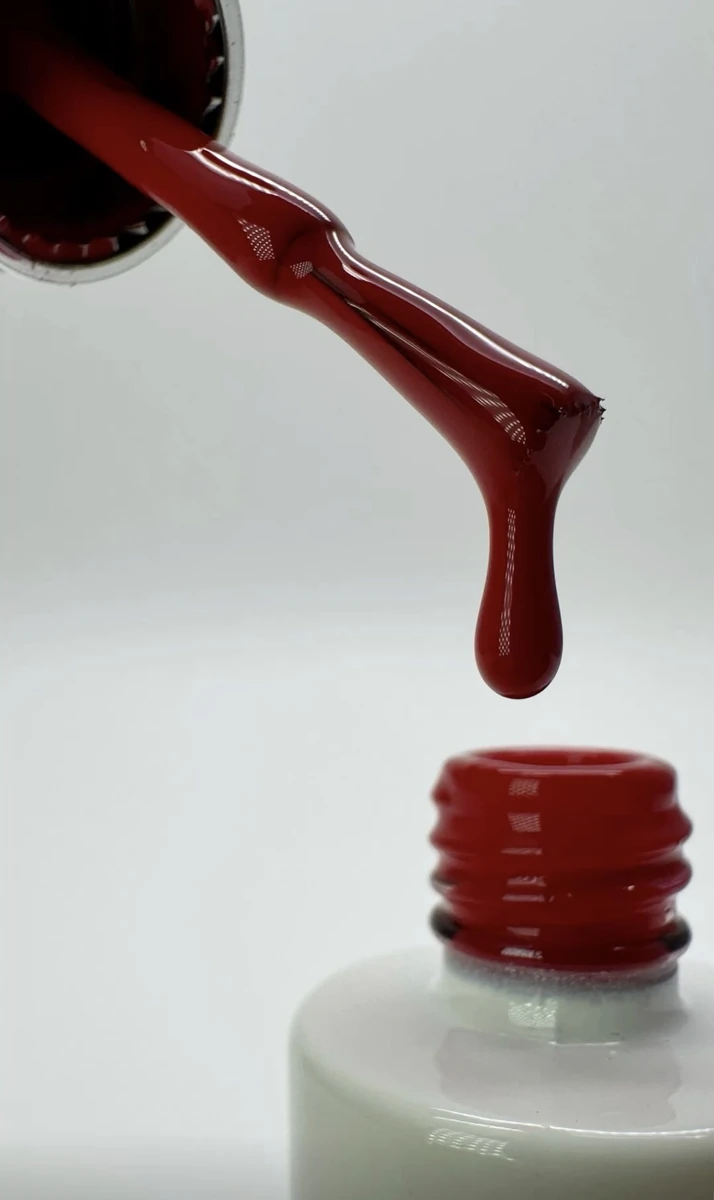 Red nail polish detail